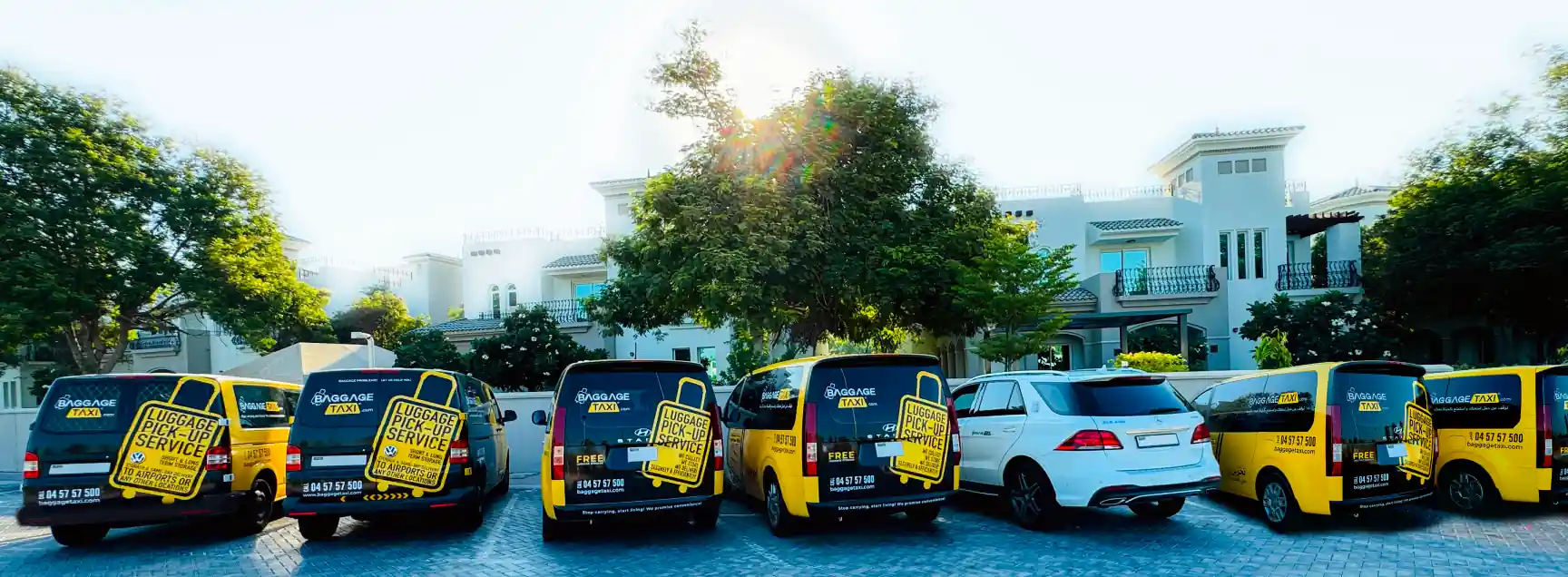 Our delivery fleet of yellow and black vans